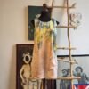 Vestido con diseño de hojas verdes