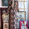 Jumpsuit de short con capa