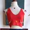 Top de punto color naranja