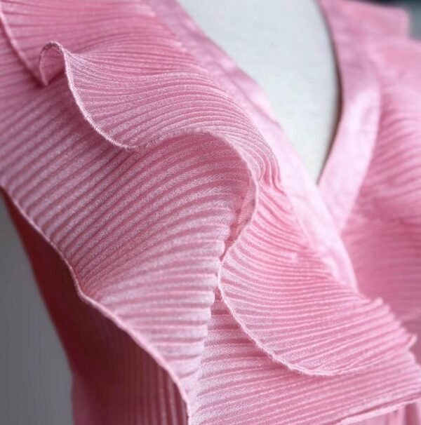 Blusa color rosa pastel con holanes