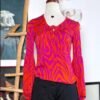 Blusa color fuscia y naranja