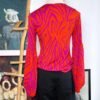 Blusa color fuscia y naranja