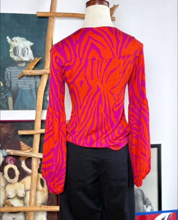 Blusa color fuscia y naranja