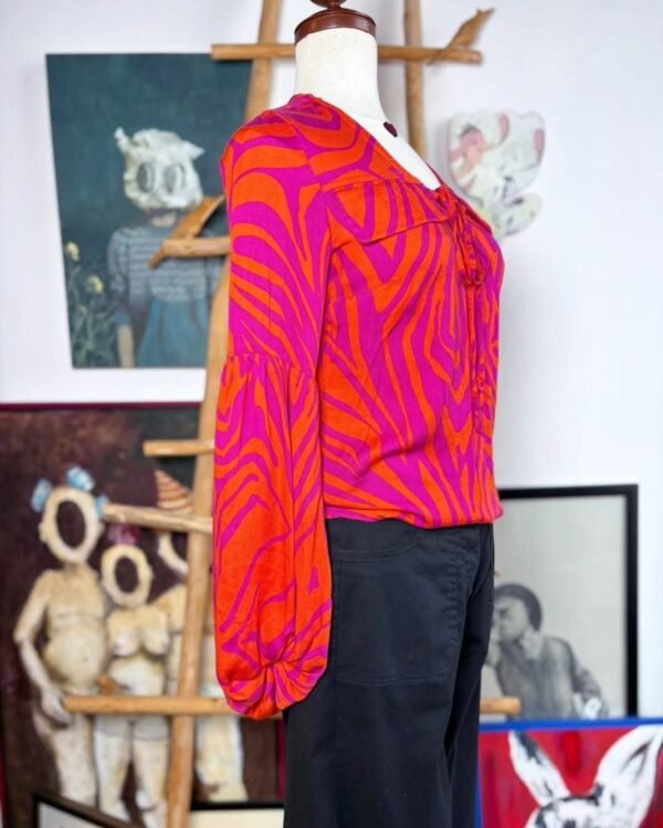 Blusa color fuscia y naranja
