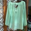 Blusa color aguamarina