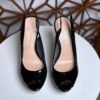 Zapatillas peep-toe de charol color negro