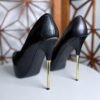 Plataformas stiletto con tacón dorado